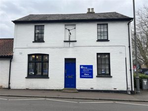the photo shows the outside of our Ware wellbeing centre, you can see the front door, two downstairs windows and two upstairs windows