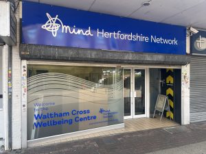 the photo shows the front of our Waltham Cross wellbeing centre, which now has a new big blue branded sign above the entrance